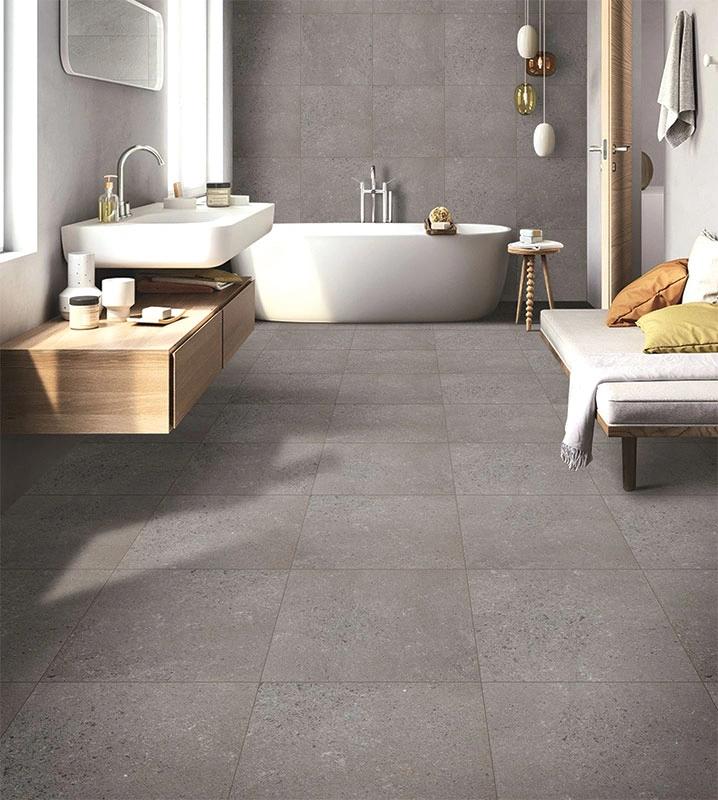 Ceramic and porcelain tiles installed in bathroom for moisture resistance in humid climate