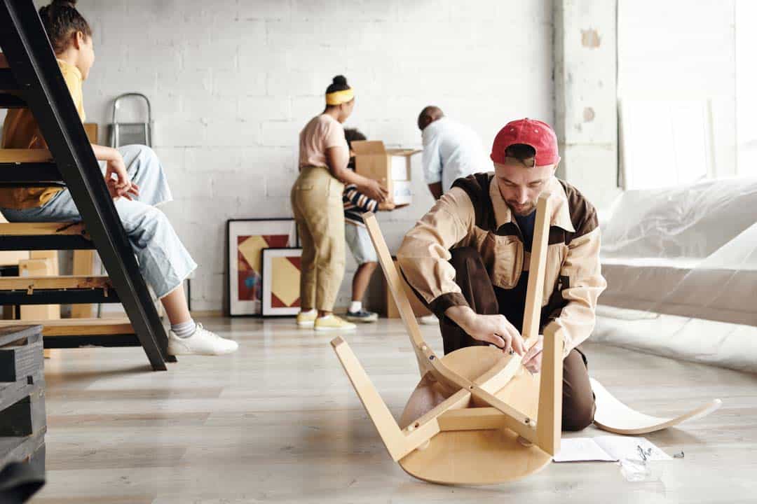 Young furniture assemblage specialist standing on — the kind of furniture assembly our vetted local pros handle in Sarasota, FL