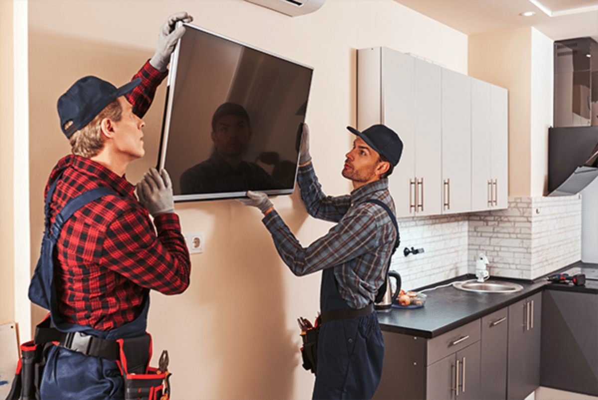 Wall-mounted flat-screen TV installed by expert handyman