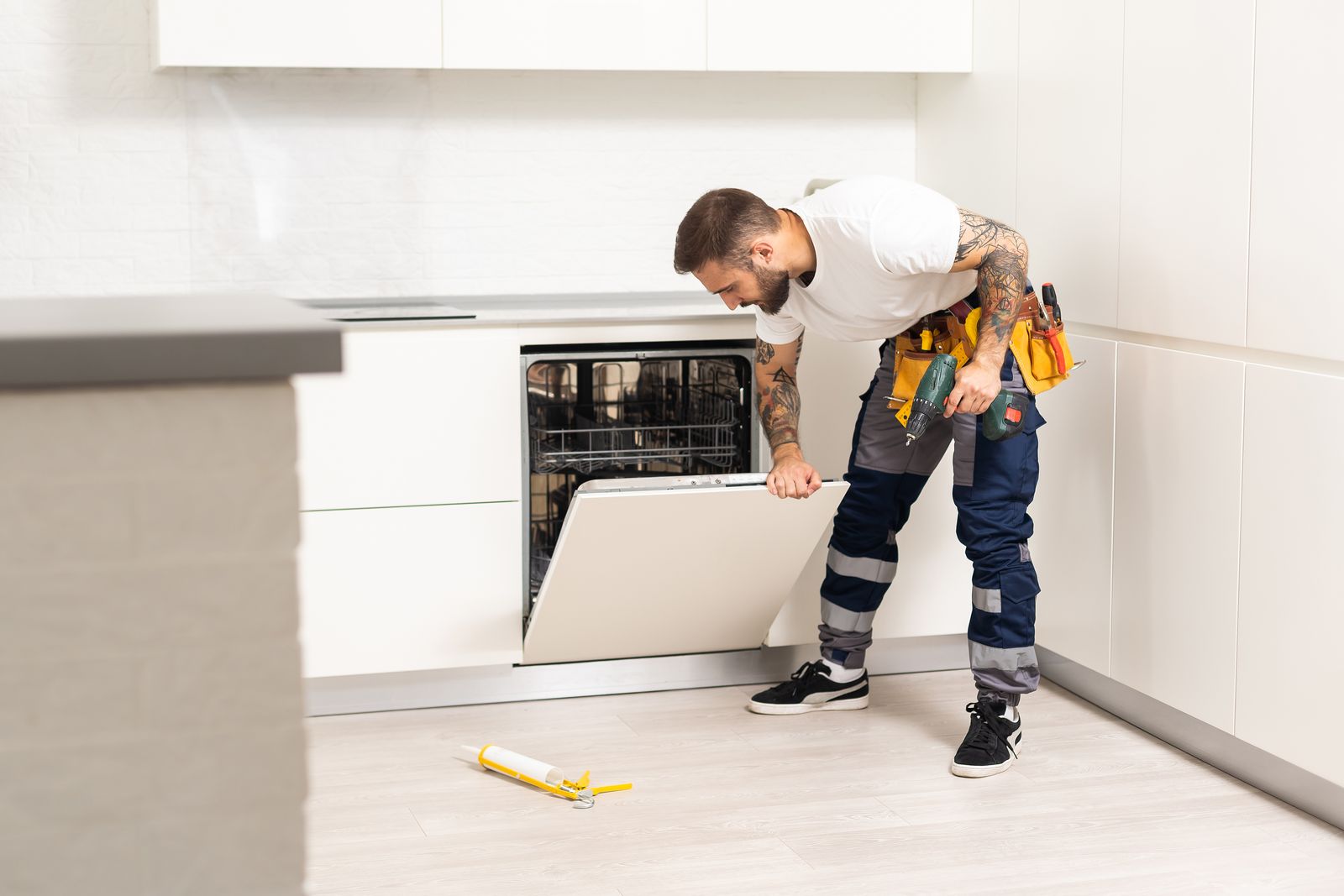 Dishwasher repair in a modern kitchen