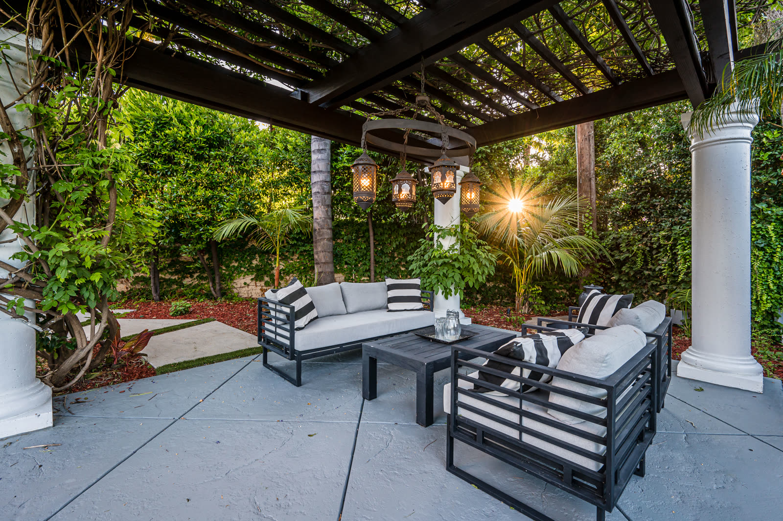 patio with white couches and chairs in a modern ne — Pressure Washing in Sarasota, FL
