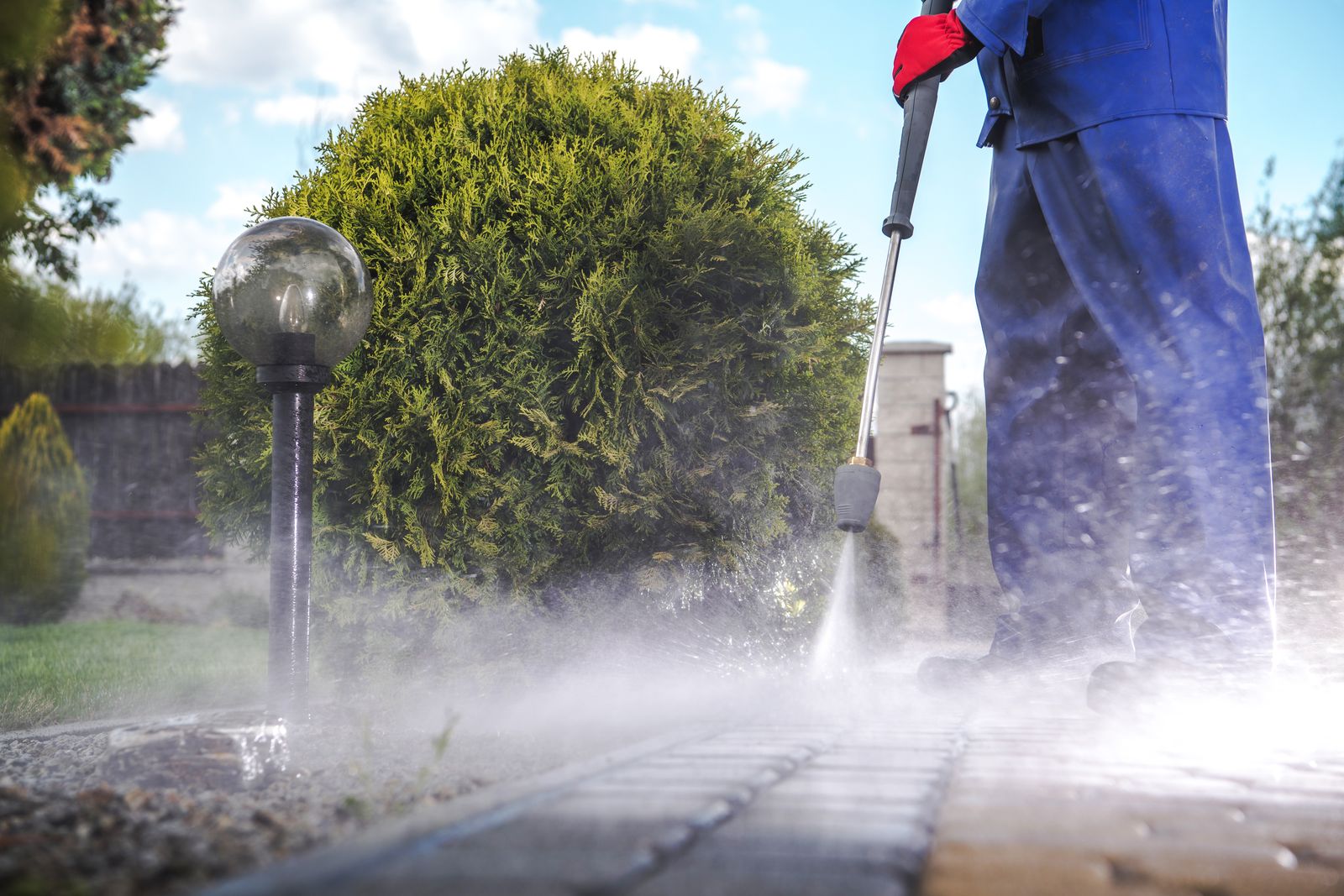 Driveway, half done — pressure washing by vetted local pros