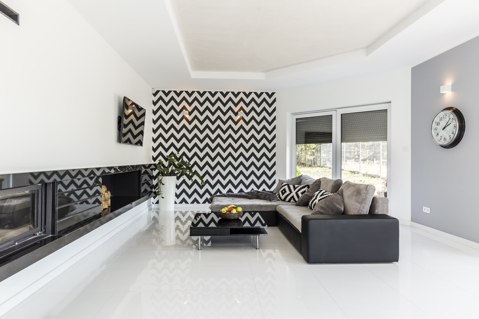 bright living room with stylish couch — Rental Repair & Maintenance in Sarasota, FL