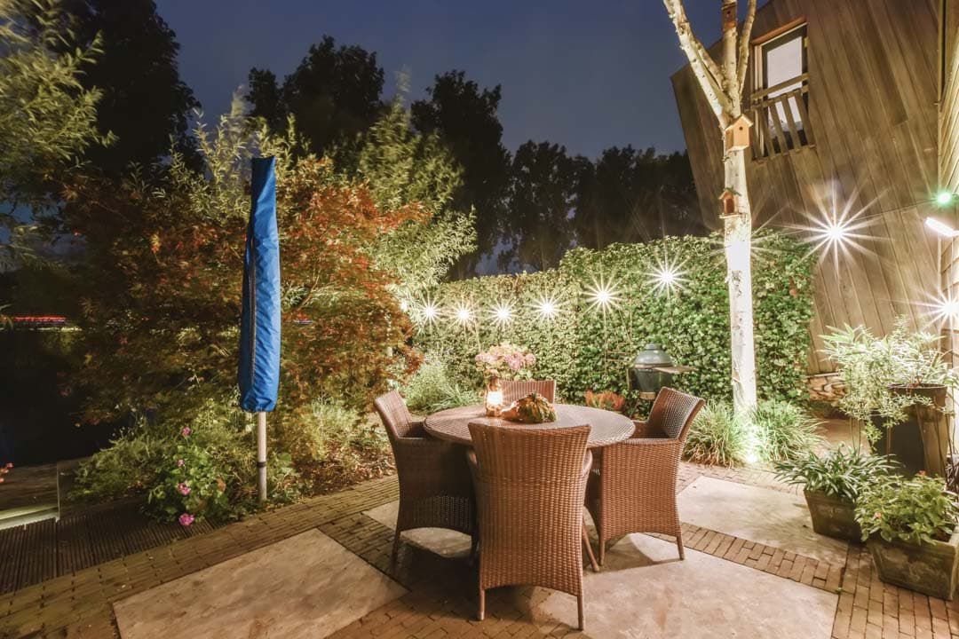 Courtyard with greenery — the kind of lighting installation our vetted local pros handle in Sarasota, FL