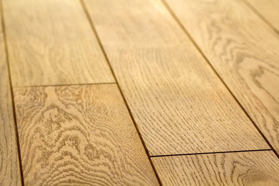 Natural light brown wooden parquet floor boards — the kind of tile & flooring our vetted local pros handle in Sarasota, FL